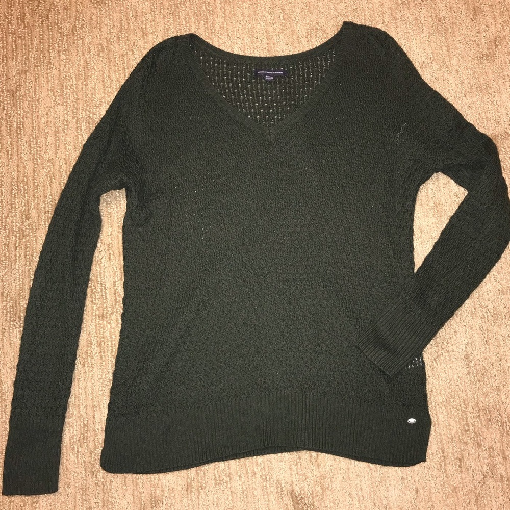 green sweater